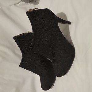 Black bootie-style heels